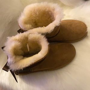 Like new only worn twice. Custom made with the LV on the back of the boots.